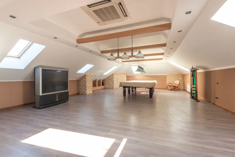 The Space Above the Ceiling: How Attic Architecture Defines a Home's True Ambition